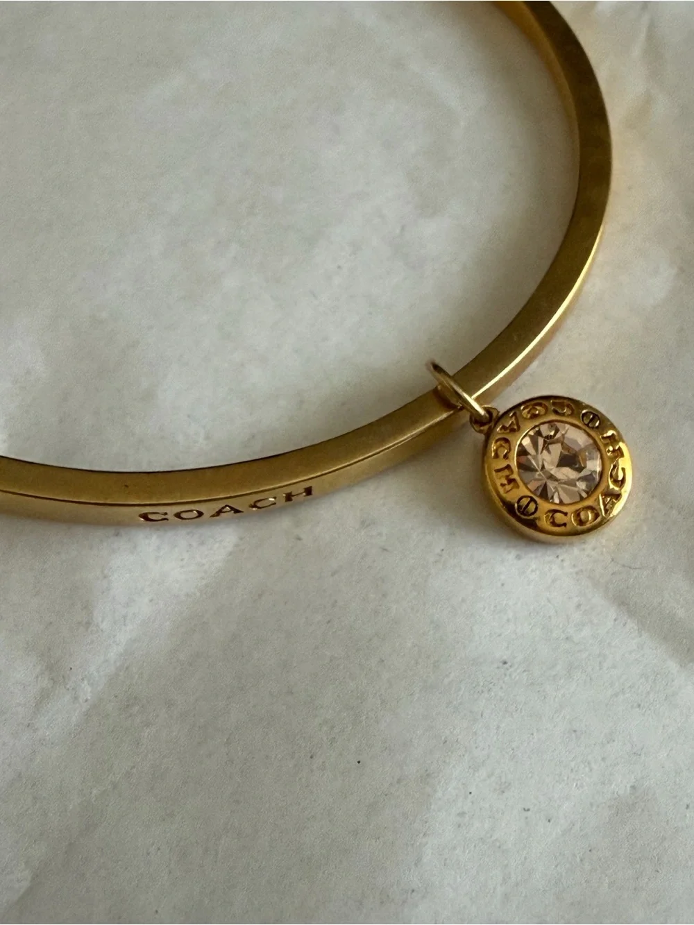 Coach Two-Tone Gold and Silver Stacked Bangle Set with Charm
